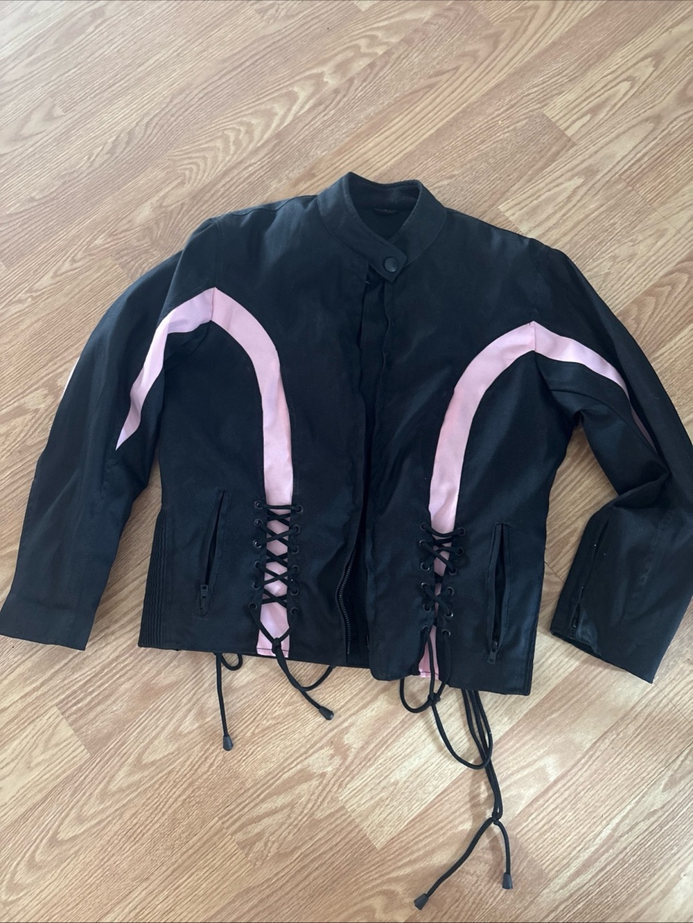 Women’s Black Textile Riding Jacket with Pink Accent and Lace-Up Details